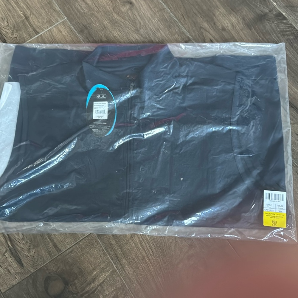New In original package Greg Norman NVY Weatherknit Jacquard Full Zip Vest Large